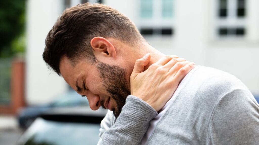 Man Experiencing Neck Pain